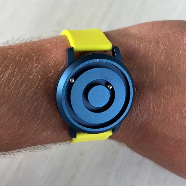 Magneto-Watch-Jupiter-Blue-Silikon-Gelb-Handgelenk-Video