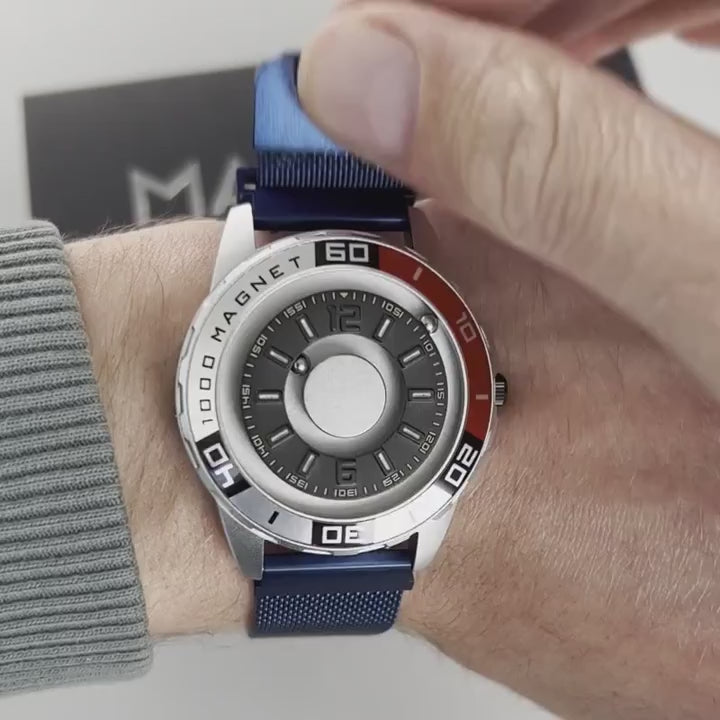 Magneto-Watch-Uranus-Red-Maschenarmband-Blau-Handgelenk-Video